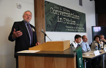 Mike Fancher leads the panel at the 2009 Hulteng Conversations in Ethics Conference Mike Fancher leads the panel at the 2009 Hulteng Conversations in Ethics Conference